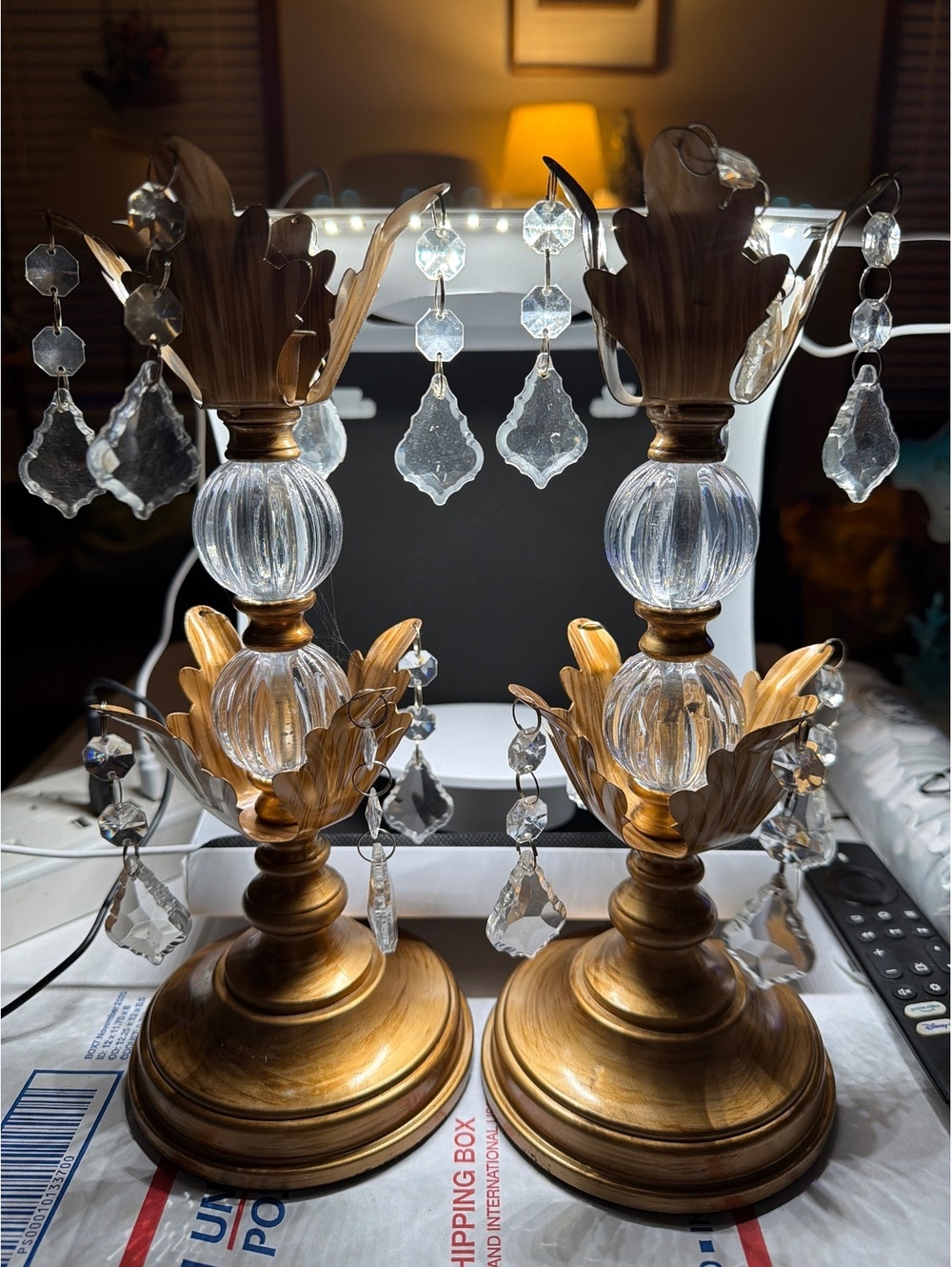 Pair of gold tone crystal candlesticks